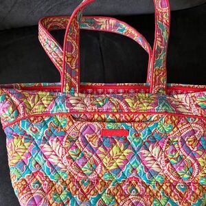 Adorable Vera Bradley full zipper multi-color bag. Size: 16in wide by 9in deep.